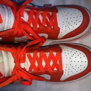 Boys orange/white Nike Dunks